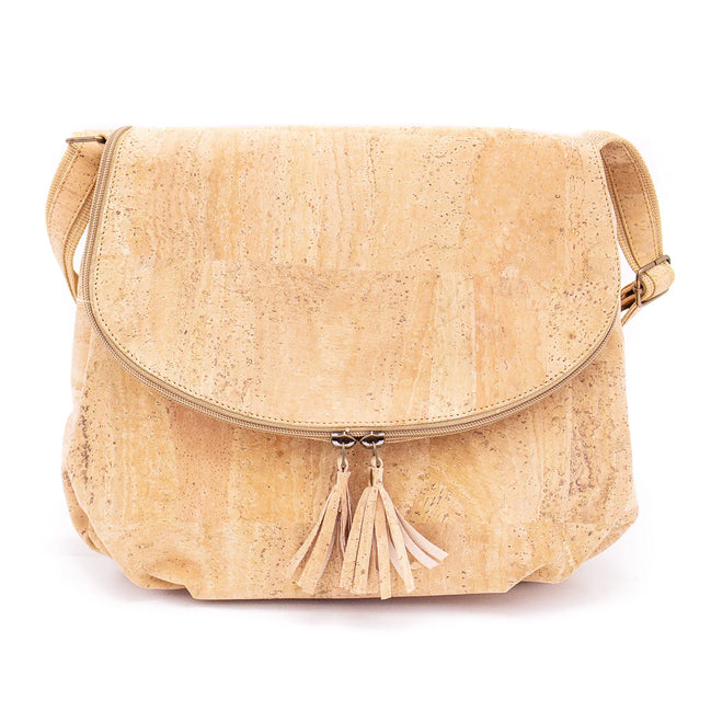 Front view of natural cork crossbody bag with tassel flap