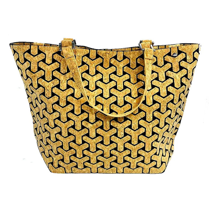 Cork geometric patterned handbag on a white background