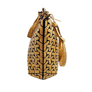Cork patterned handbag with a strap on a white background