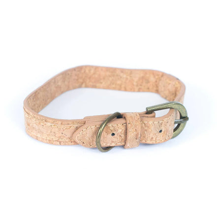 Adjustable natural cork dog collar with brass buckle, front view.