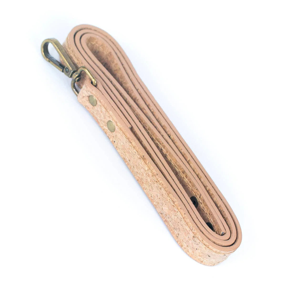 Folded natural cork dog leash with brass clip and reinforced stitching.