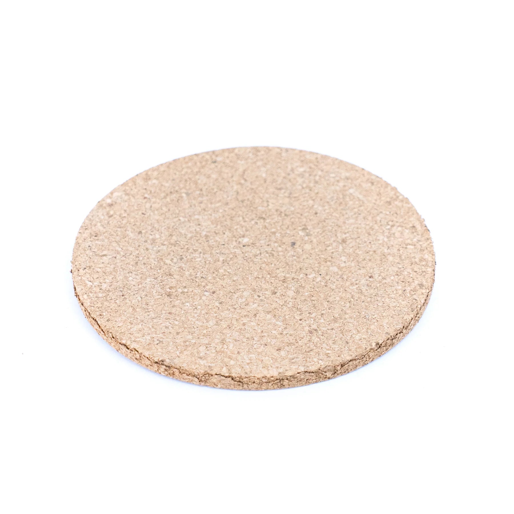Round cork coaster on a white background