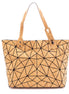 Geometric cork tote bag with black triangular pattern and adjustable handles
