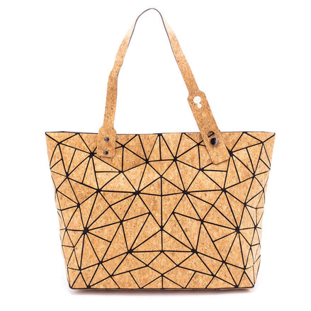 Geometric cork tote bag with black triangular pattern and adjustable handles