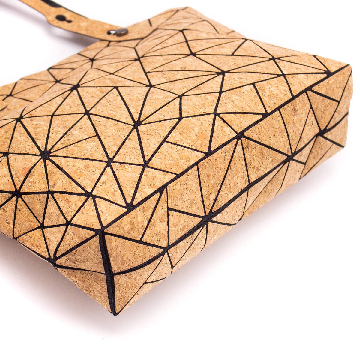 Botton view Geometric print cork tote bag with black triangular pattern and adjustable handles