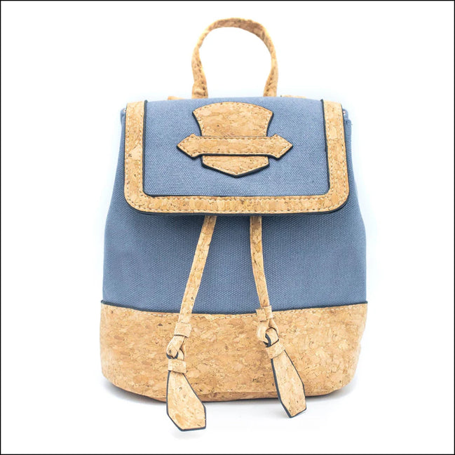 Blue backpack with cork accents on a white background