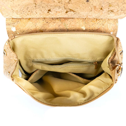 Interior of gold-fleck cork backpack showing pockets and lining