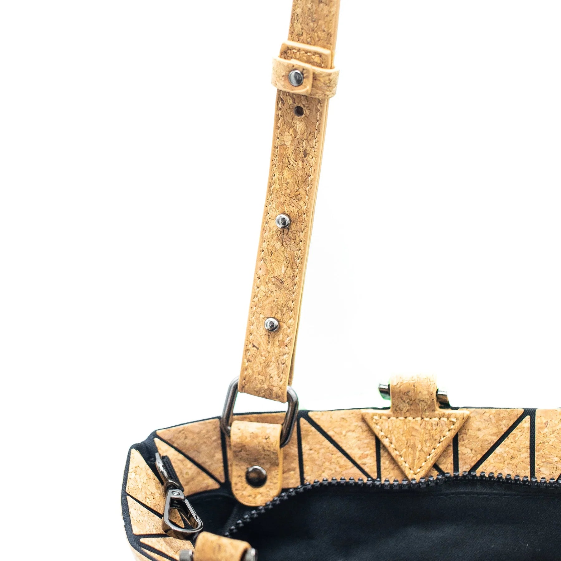 Close-up of adjustable Cross-Road Geometric Cork Handbag strap hardware ‚Äì metal details and stitched natural cork texture