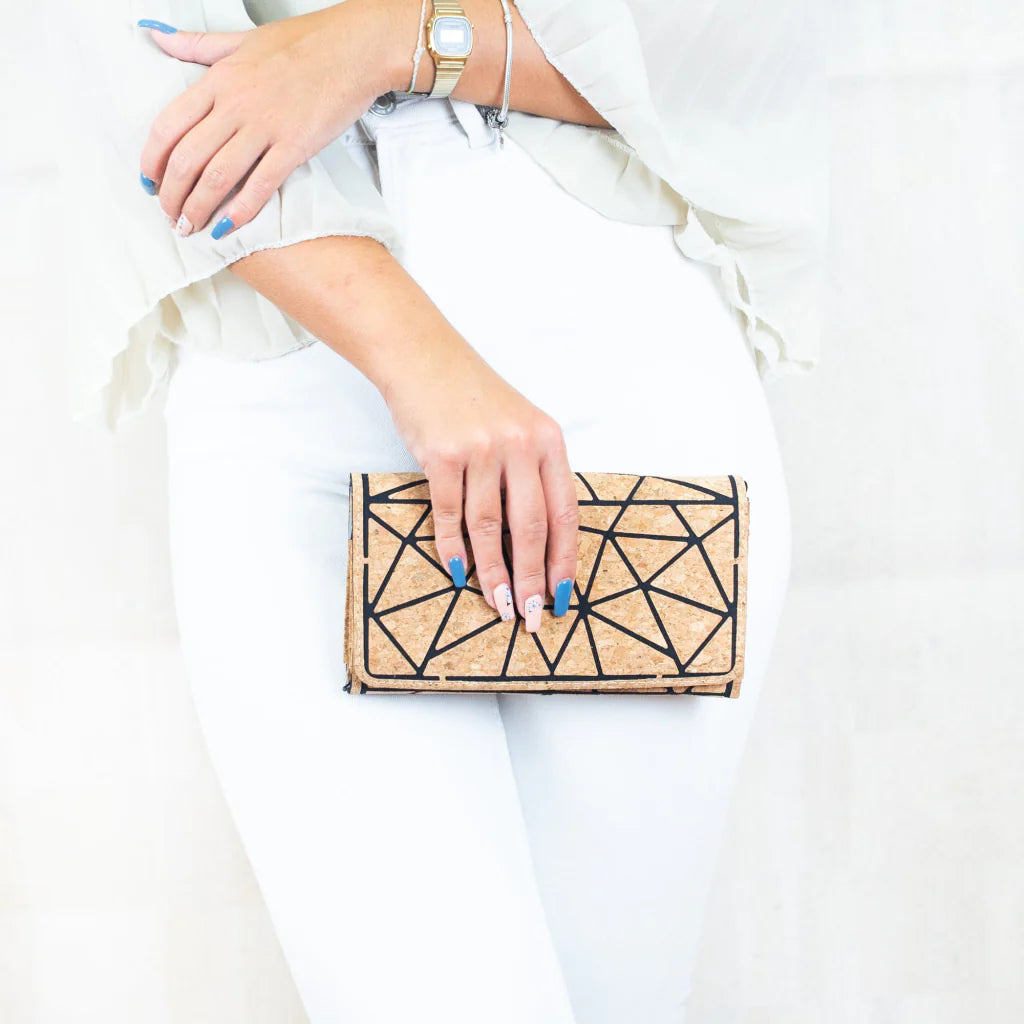 Cork geometric crossbody wallet with chain strap over shoulder