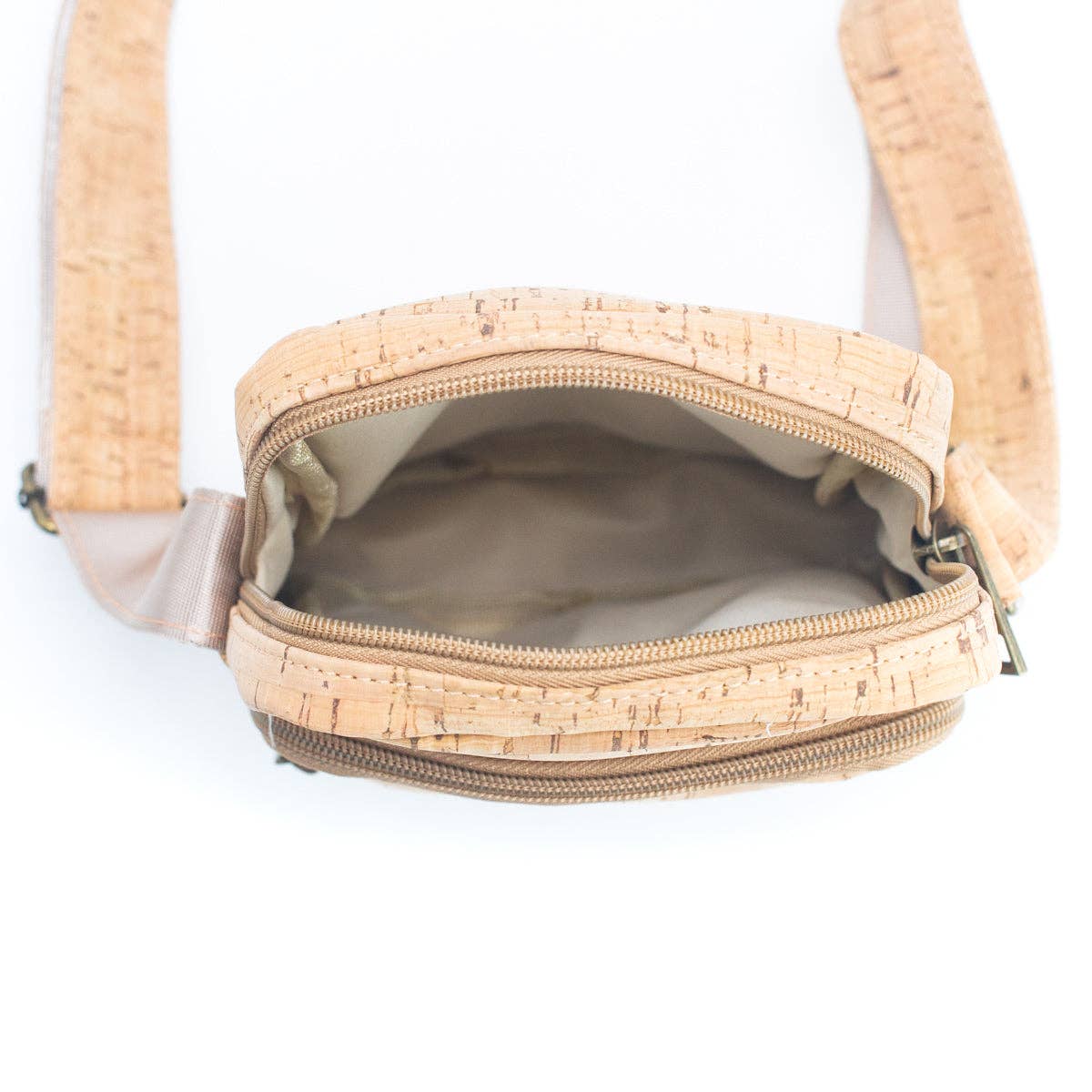 Interior of cork messenger bag with zipper opening