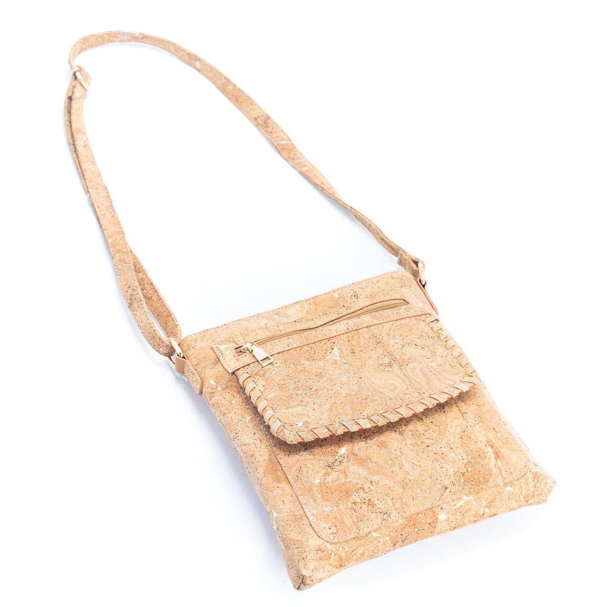 Angled view cork crossbody purse with gold hardware