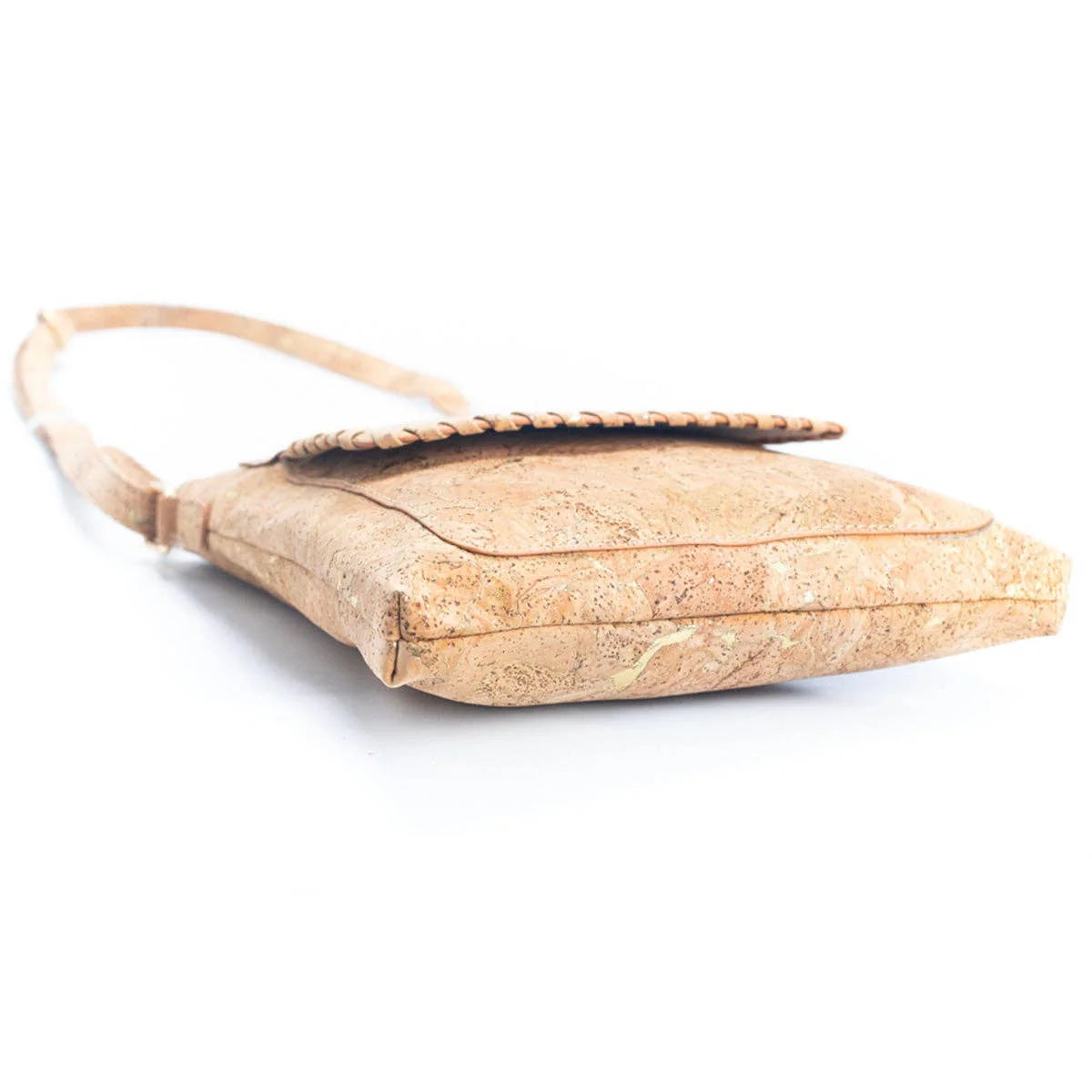 Angled view cork crossbody purse with gold hardware