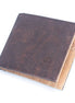 A slim, lightweight dark brown RFID protected bi-fold cork wallet that keeps your essentials organized without the bulk. 