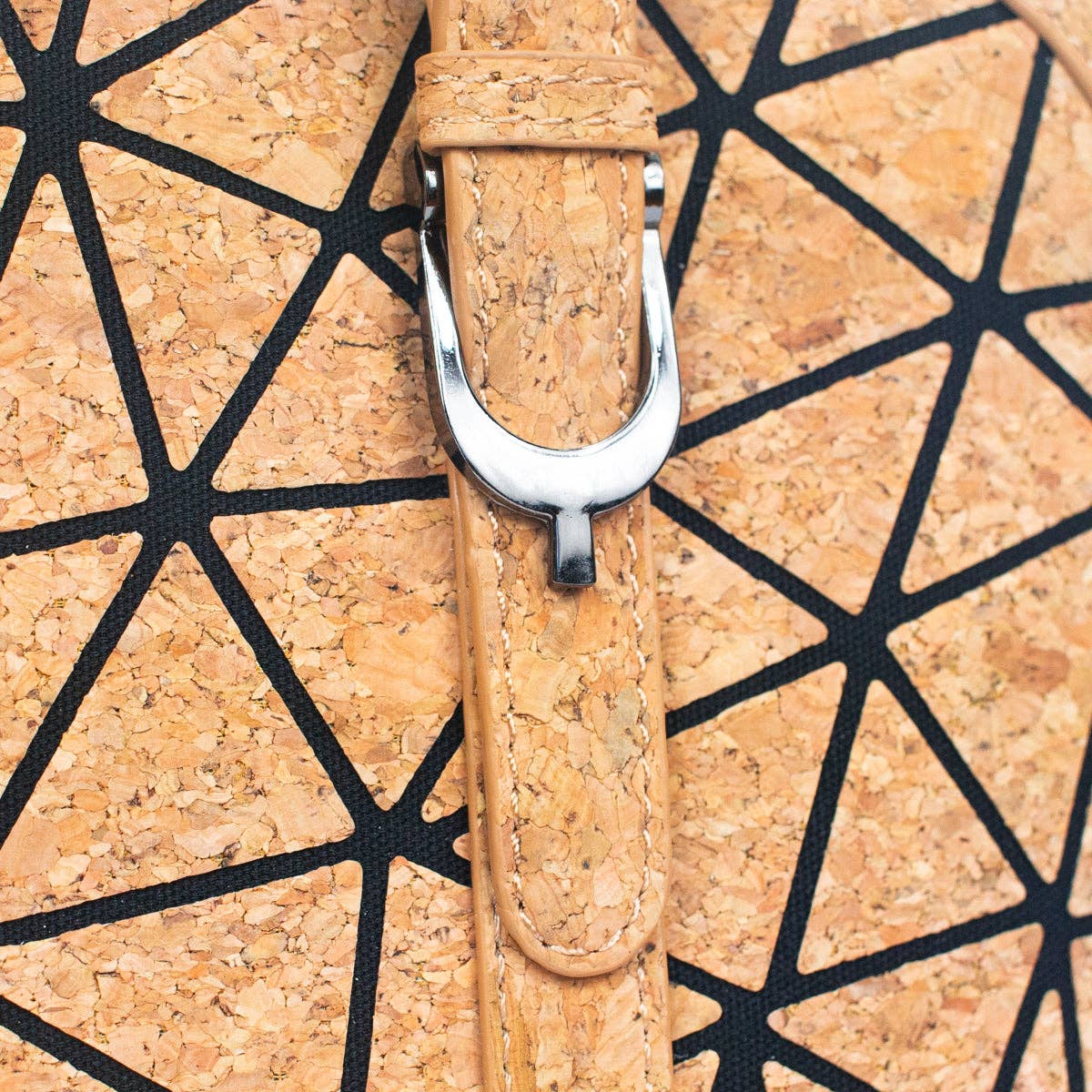 Close-up of cork handbag geometric pattern and metal hardware
