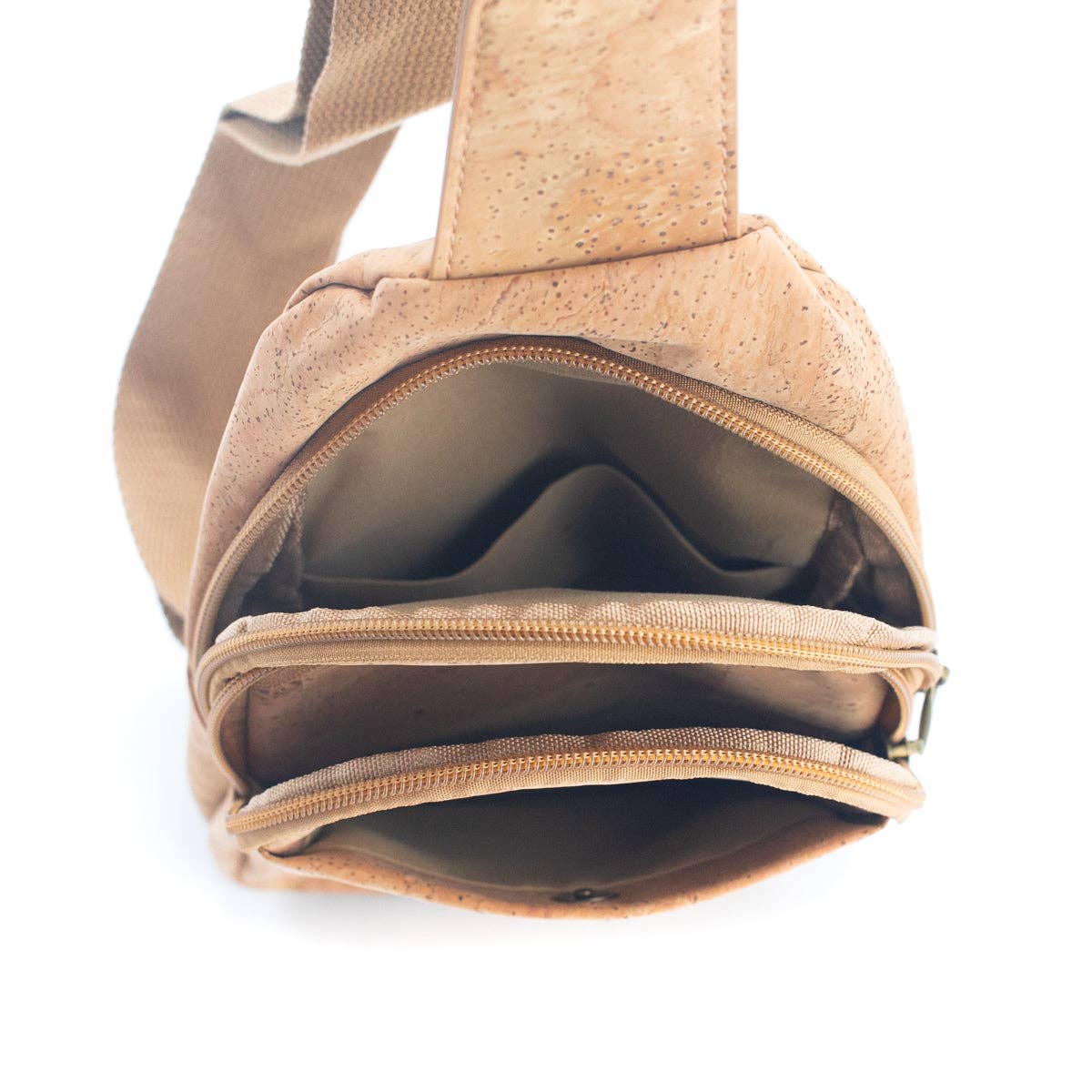 Interior storage of natural cork sling bag with multiple compartments