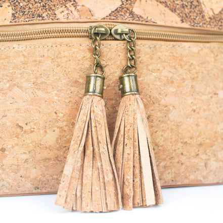 Close up of cork tassel zipper pulls on cork crossbody bag