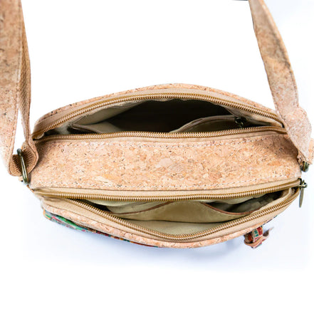 Top view showing three zippered compartments of cork crossbody bag