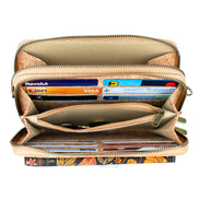 Open wallet with floral pattern showing cards and money on a white background