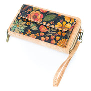 Floral patterned wallet with cork accents on a white background