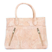 Front view of natural cork women with 2 angled zipper compartments