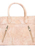 Front view of natural cork women‚Äôs handbag with diagonal zip pockets