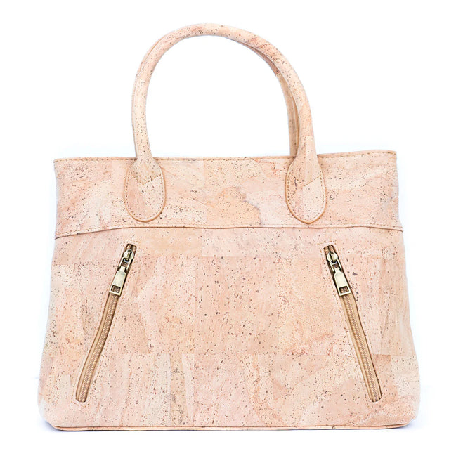 Front view of natural cork women‚Äôs handbag with diagonal zip pockets
