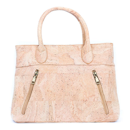 Front view of natural cork women‚Äôs handbag with diagonal zip pockets