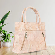 Side view of luxurious cork hand bag