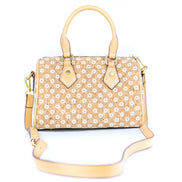 Floral Cork Crossbody Barrel Bag front view with daisy pattern and leather handles