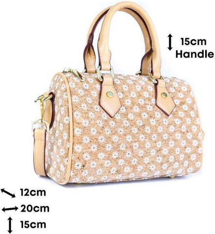 Floral Cork Crossbody Barrel Bag front view with daisy pattern and leather handles