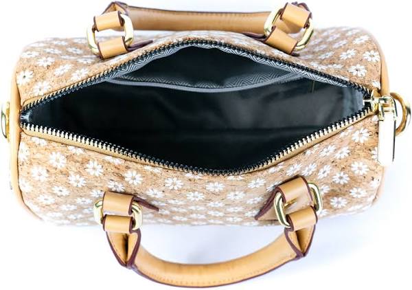 Floral Cork Crossbody Barrel Bag front view with daisy pattern and leather handles