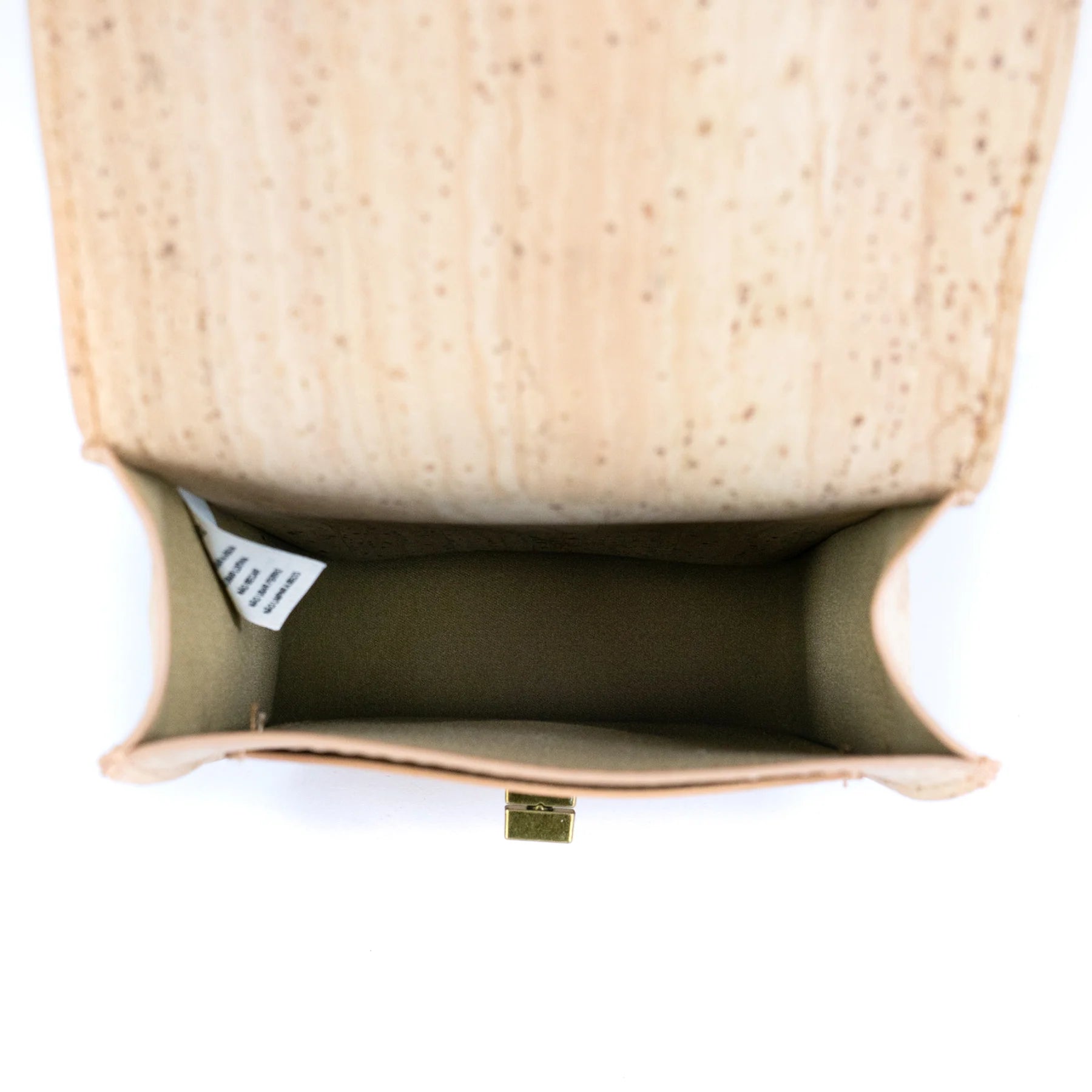 Interior view of minimalist cork phone bag compartment