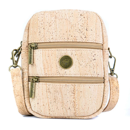 Front view of natural cork crossbody phone bag with dual zippers