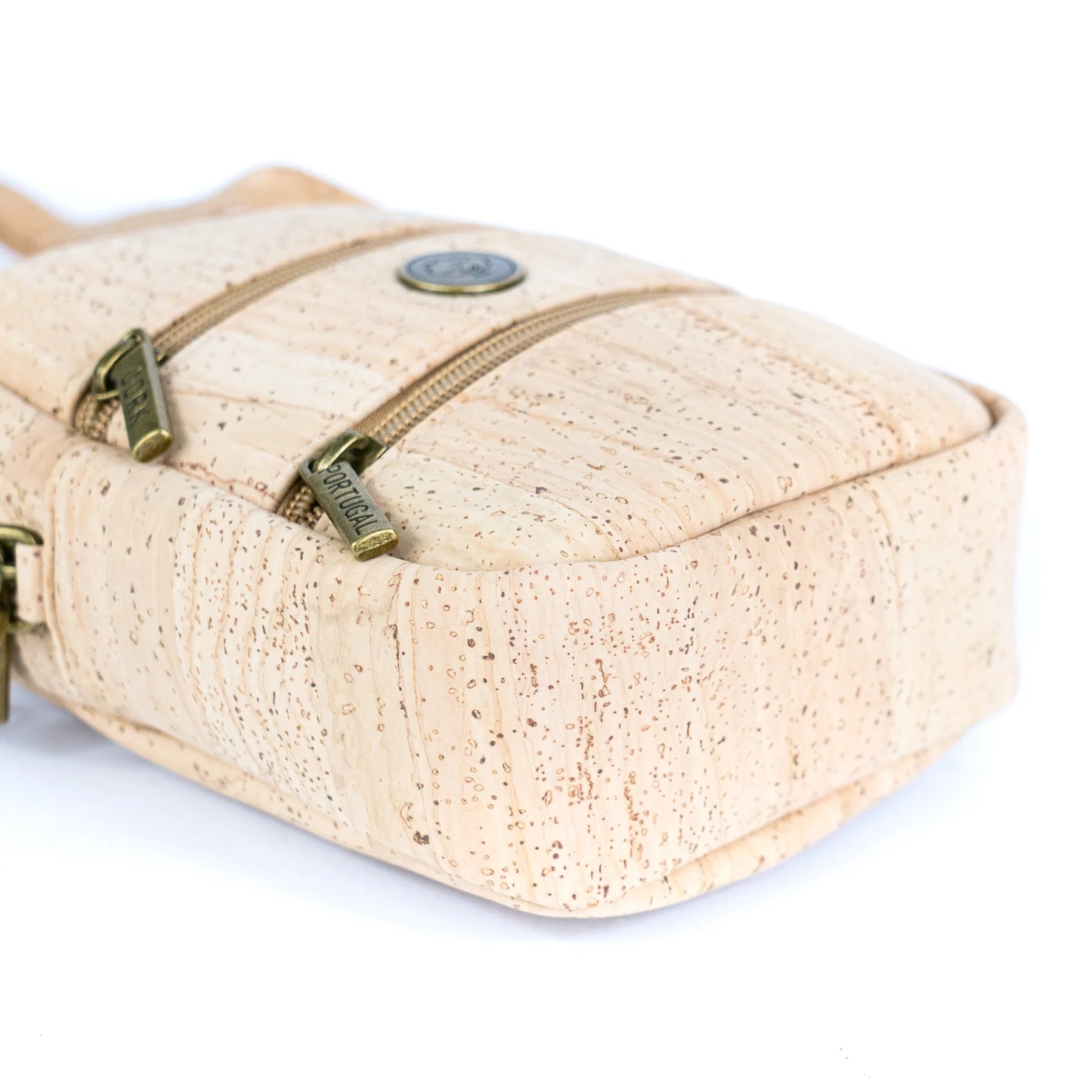 Bottom and side detail of vegan cork phone bag with natural grain