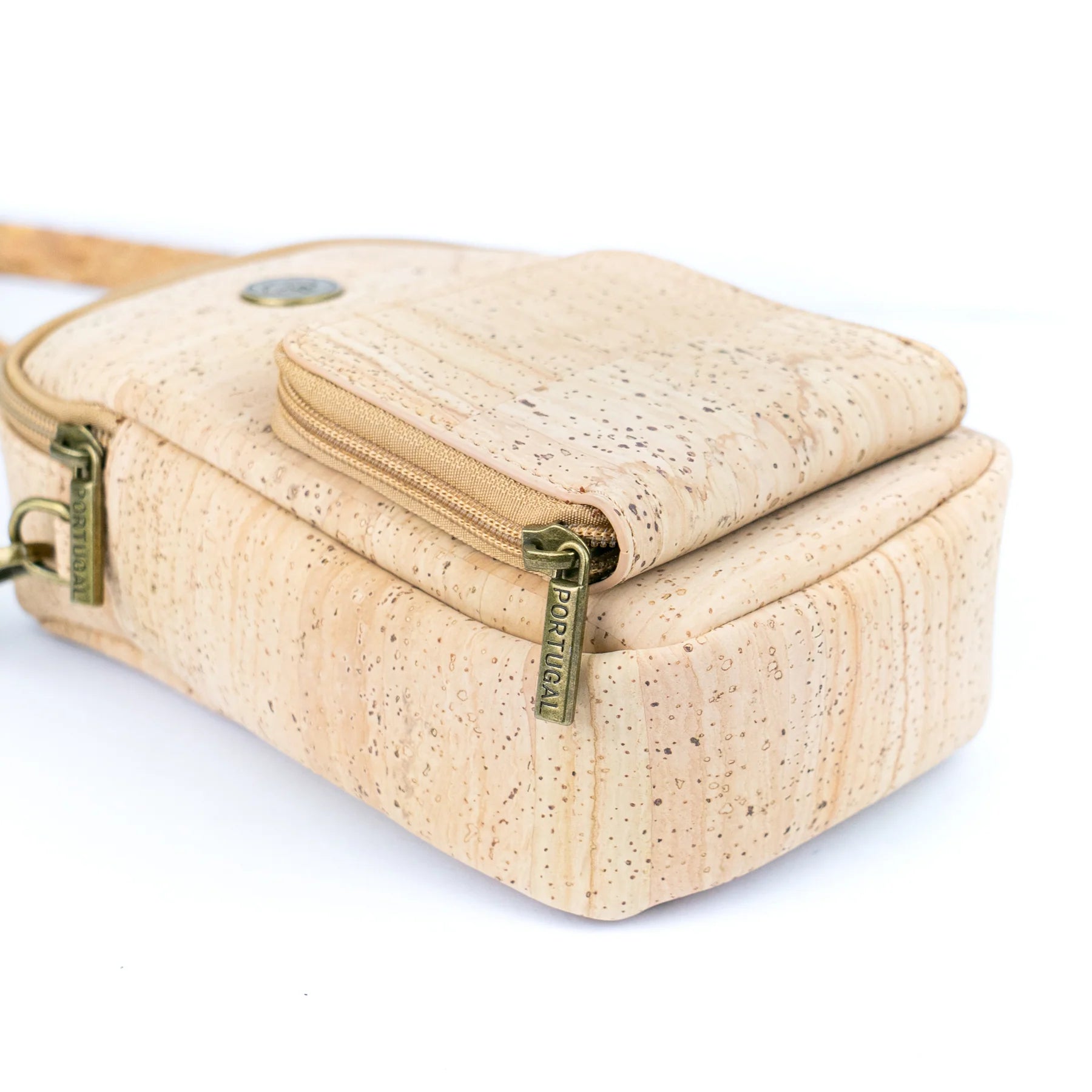 Side angled view natural cork vegan crossbody BAG