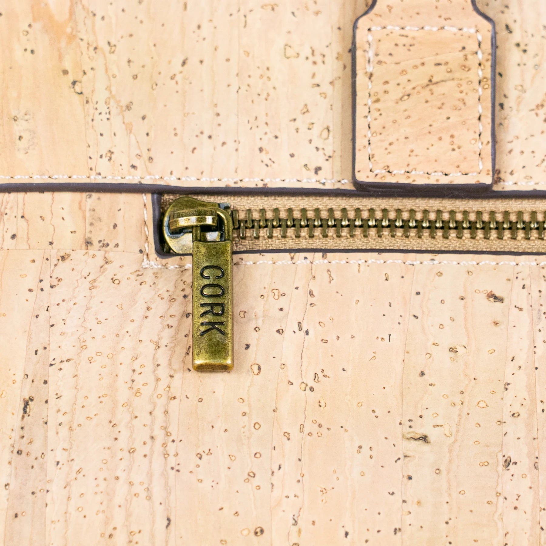 A stylish cork laptop / tote / crossbody bag with an easy, everyday elegance. 