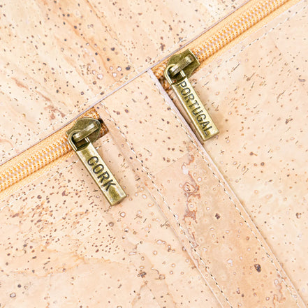Close-up zipper pull engraved CORK and PORTUGAL