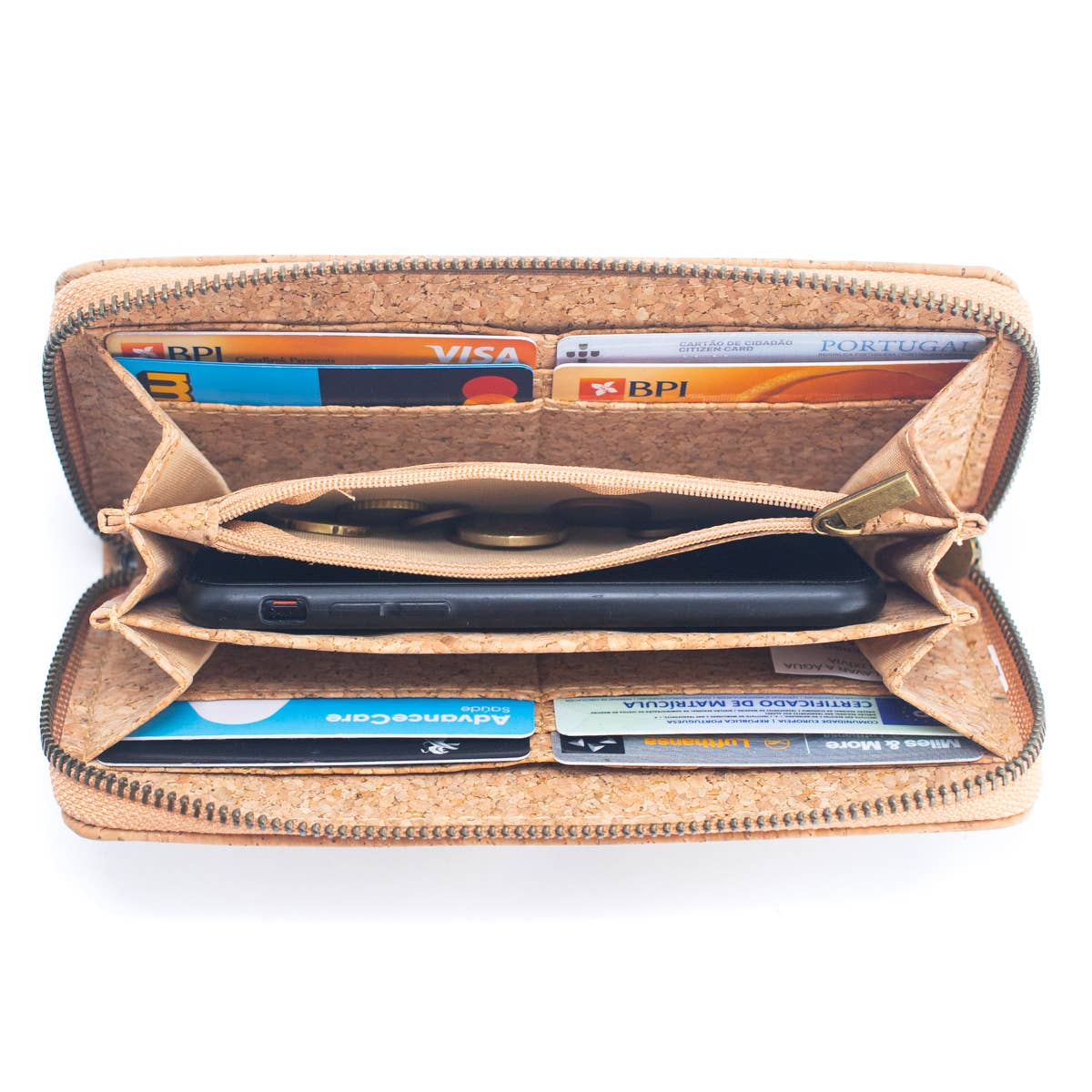 Stay stylish and organized with this natural cork vegan wallet featuring 8 card slots, 2 slip pockets, a zip coin pouch, and a wristlet.