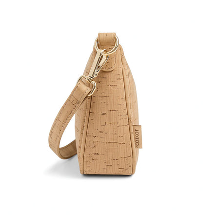 Side profile of vegan cork shoulder bag with detachable strap
