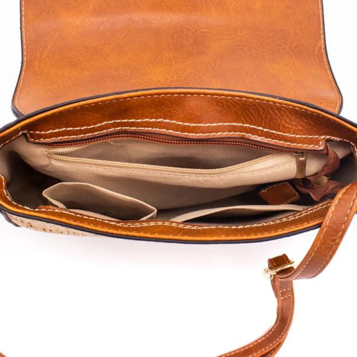Interior view of crossbody bag with pockets and vegan leather lining
