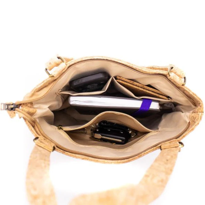 Inside of cork tote showing pockets and organized storage
