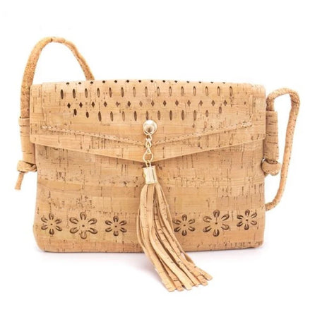 Front view of vegan cork crossbody bag with laser-cut flowers and tassel