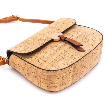 Natural cork crossbody bag front view with gold button detail and adjustable strap