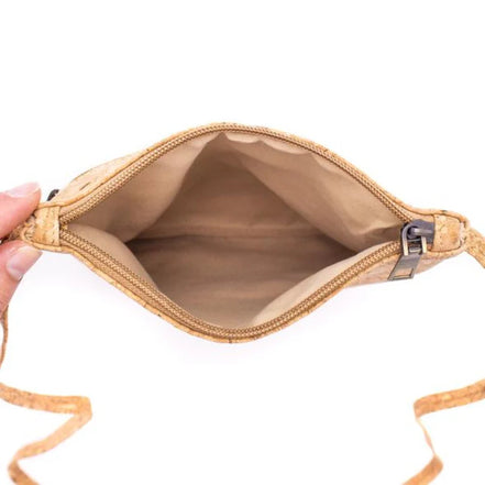 Light interior lining of sustainable cork crossbody purse with wide zip opening