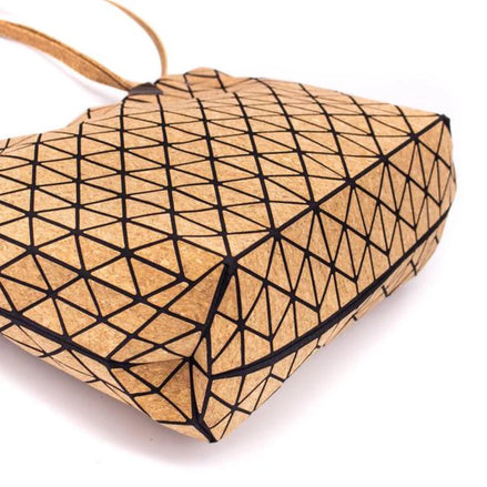 Bottom of Stylish geometric design tote or shoulder bag with natural cork texture and large interior compartment for wallet, tablet, notebooks &amp; more.