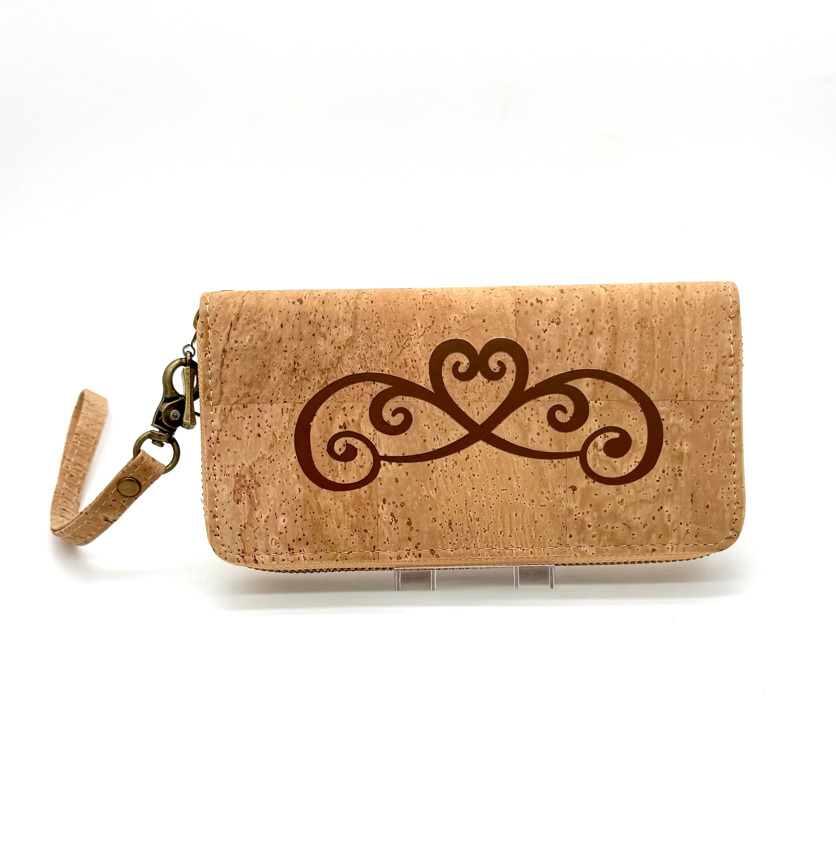 Cork wallet with decorative emblem on a white background