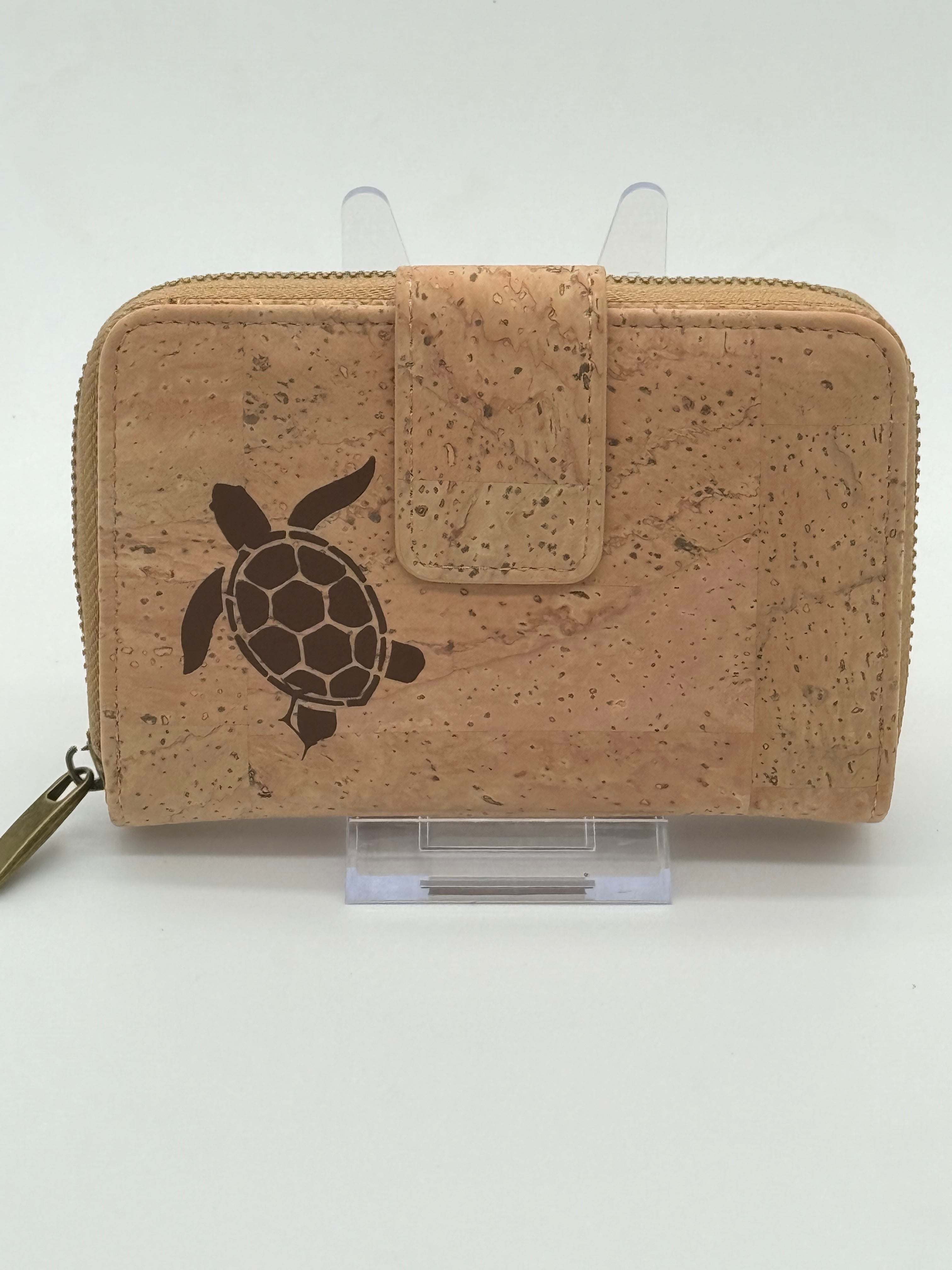 Cork wallet with a turtle design on a white background