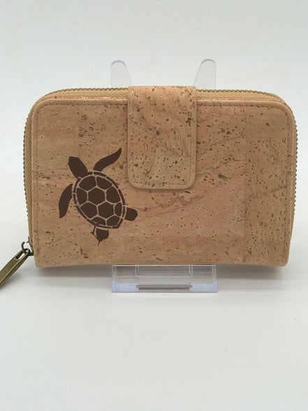 Cork wallet with a turtle design on a white background