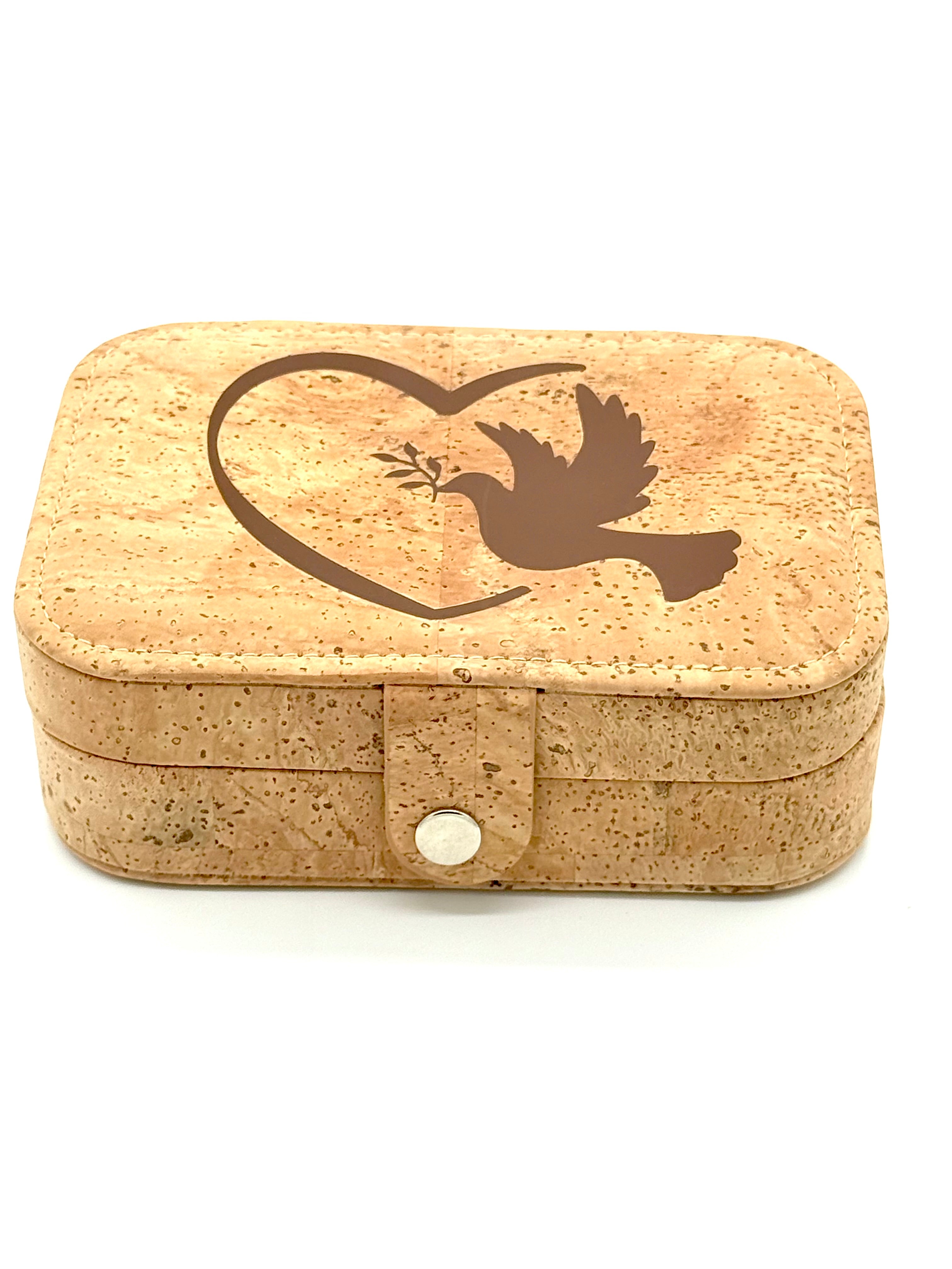 Cork jewelry box with a dove and heart on a white background