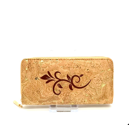 Cork wallet with a decorative leaf design on a white background